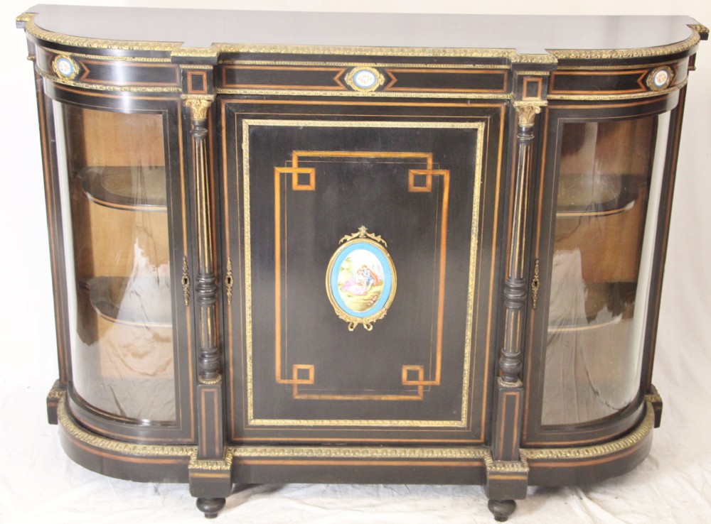 ebonised credenza with porcelain plaques