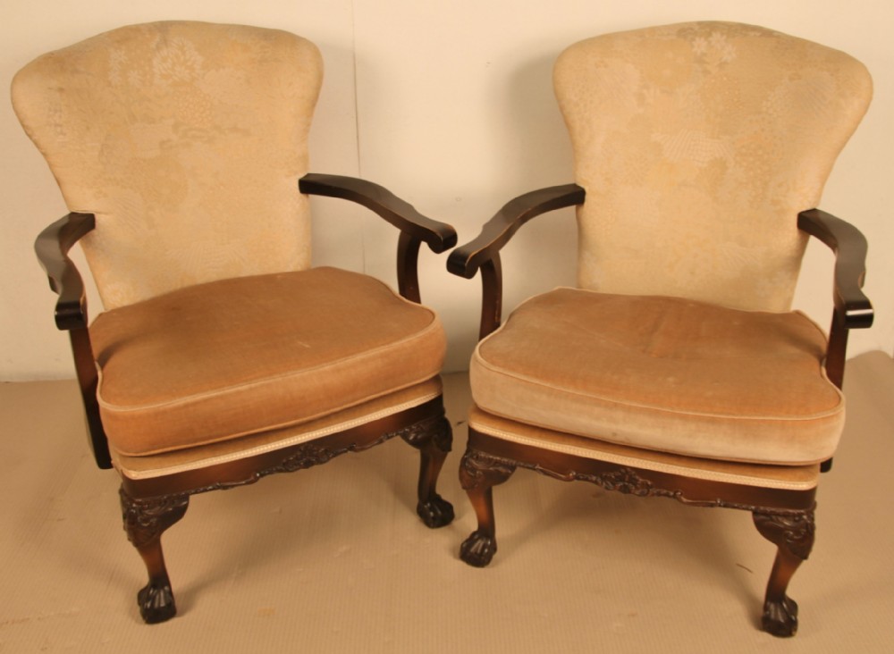 pair of chippendale style upholstered armchairs