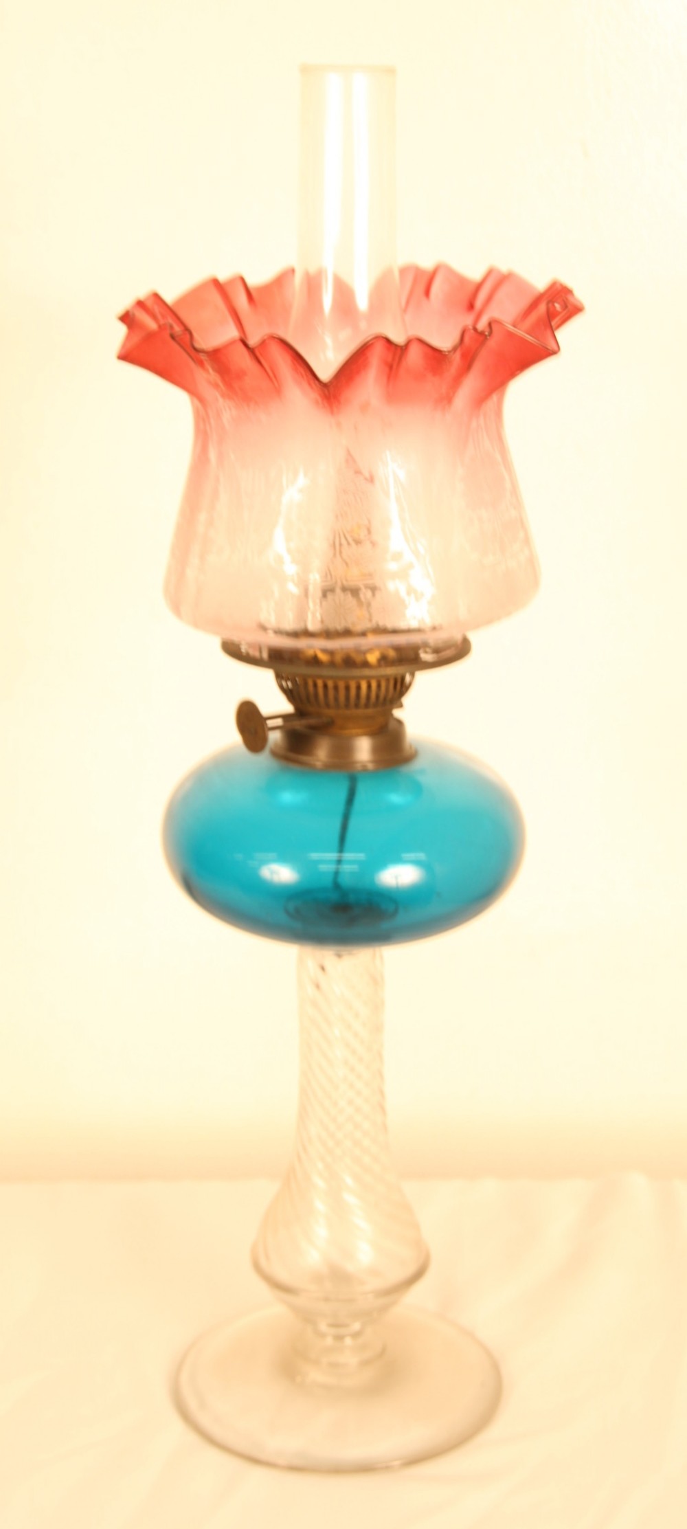 victorian oil lamp with cranberry glass shade