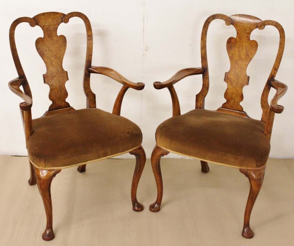 pair of queen anne style walnut armchairs