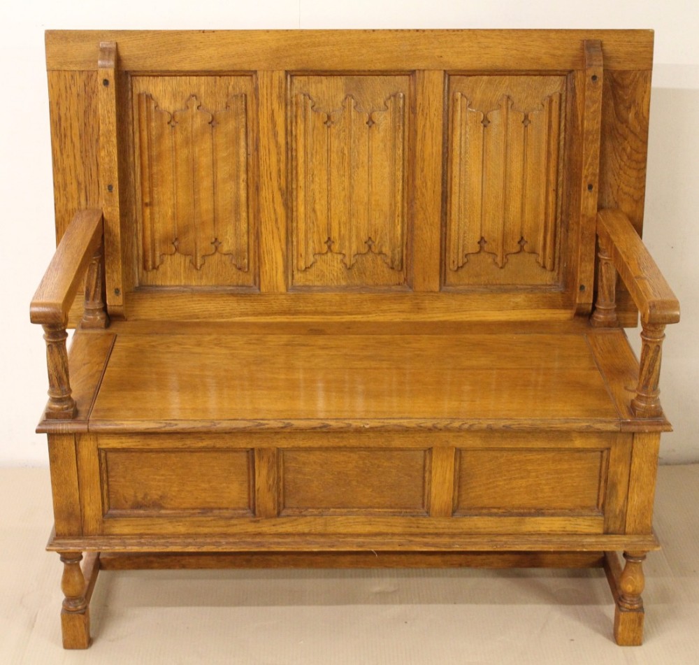 linen fold decorated oak monks bench