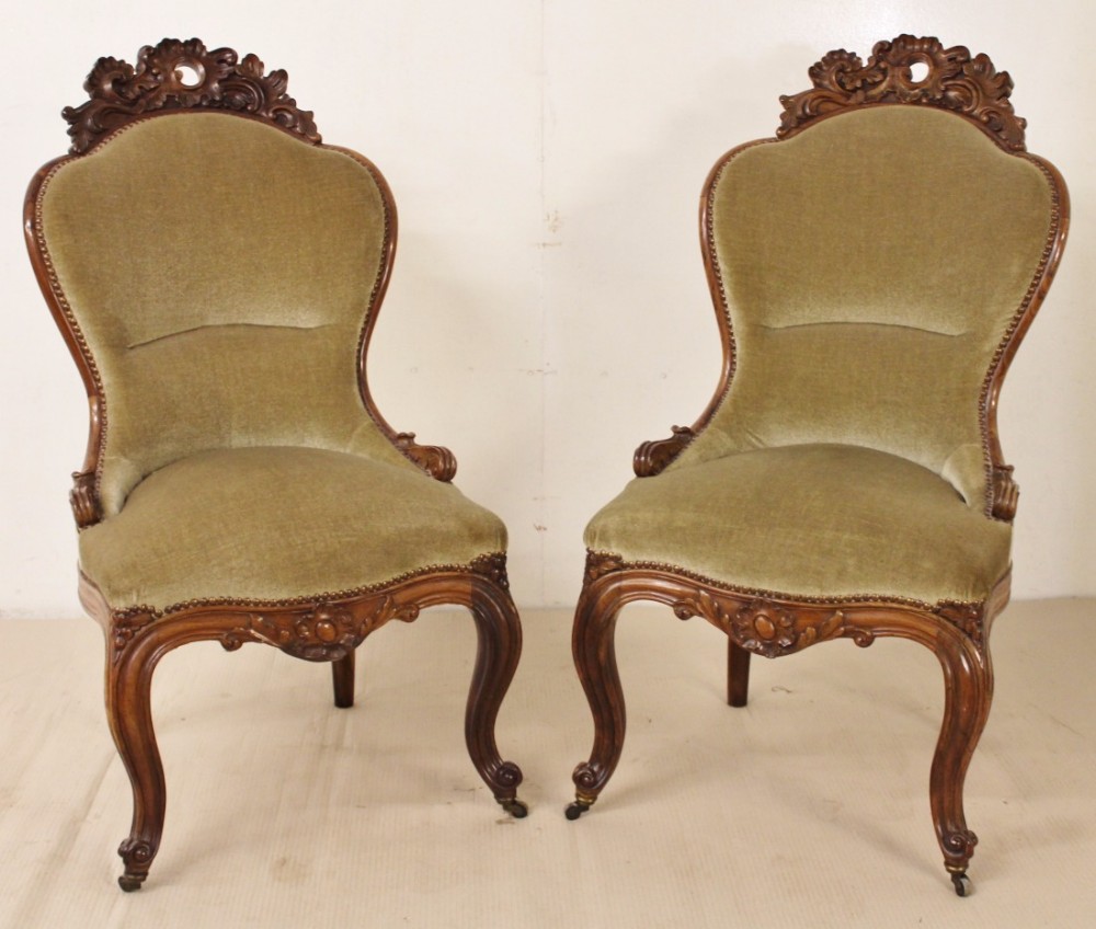 pair of upholstered rosewood chairs