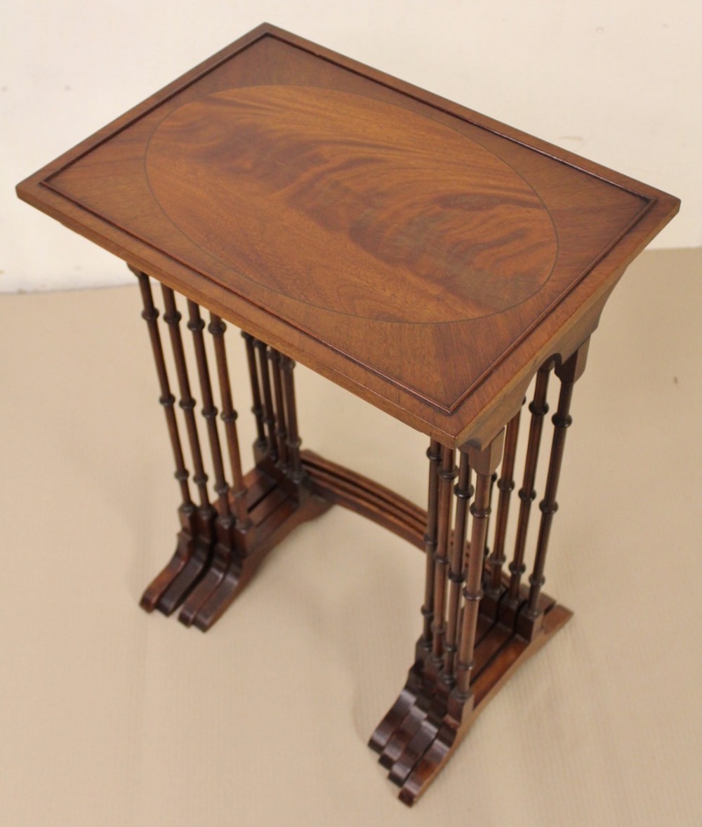 nest of 4 inlaid mahogany tables