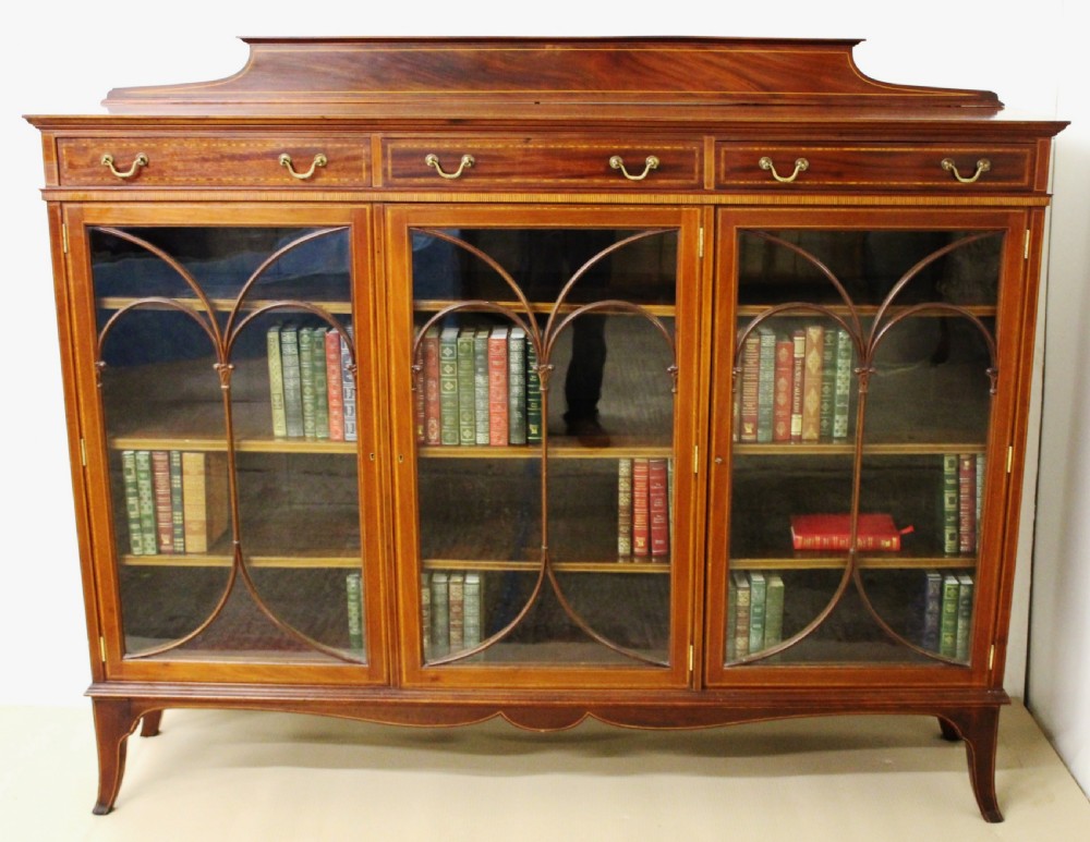 inlaid mahogany bookcase by maple and co