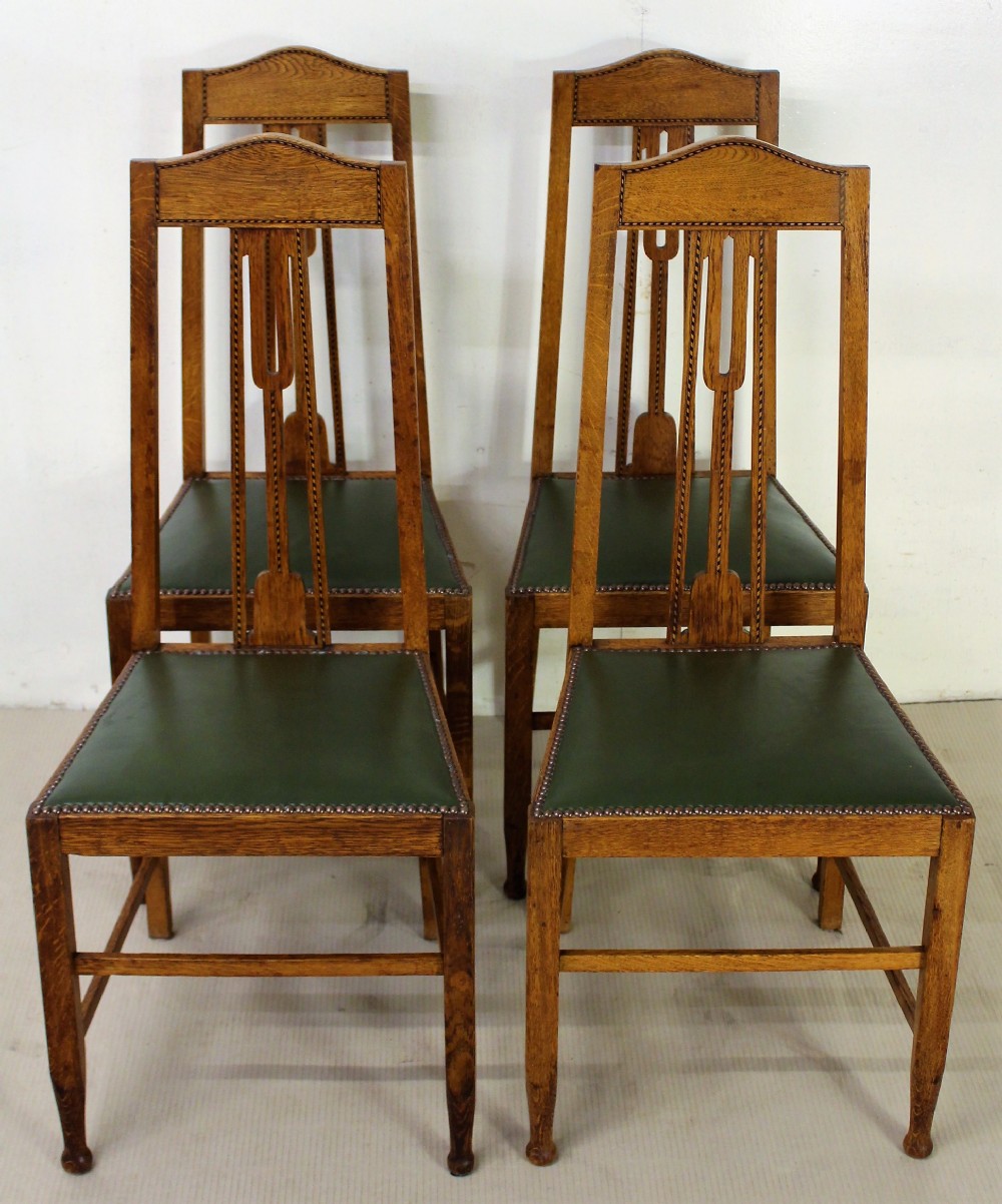 set of 4 arts and crafts oak chairs