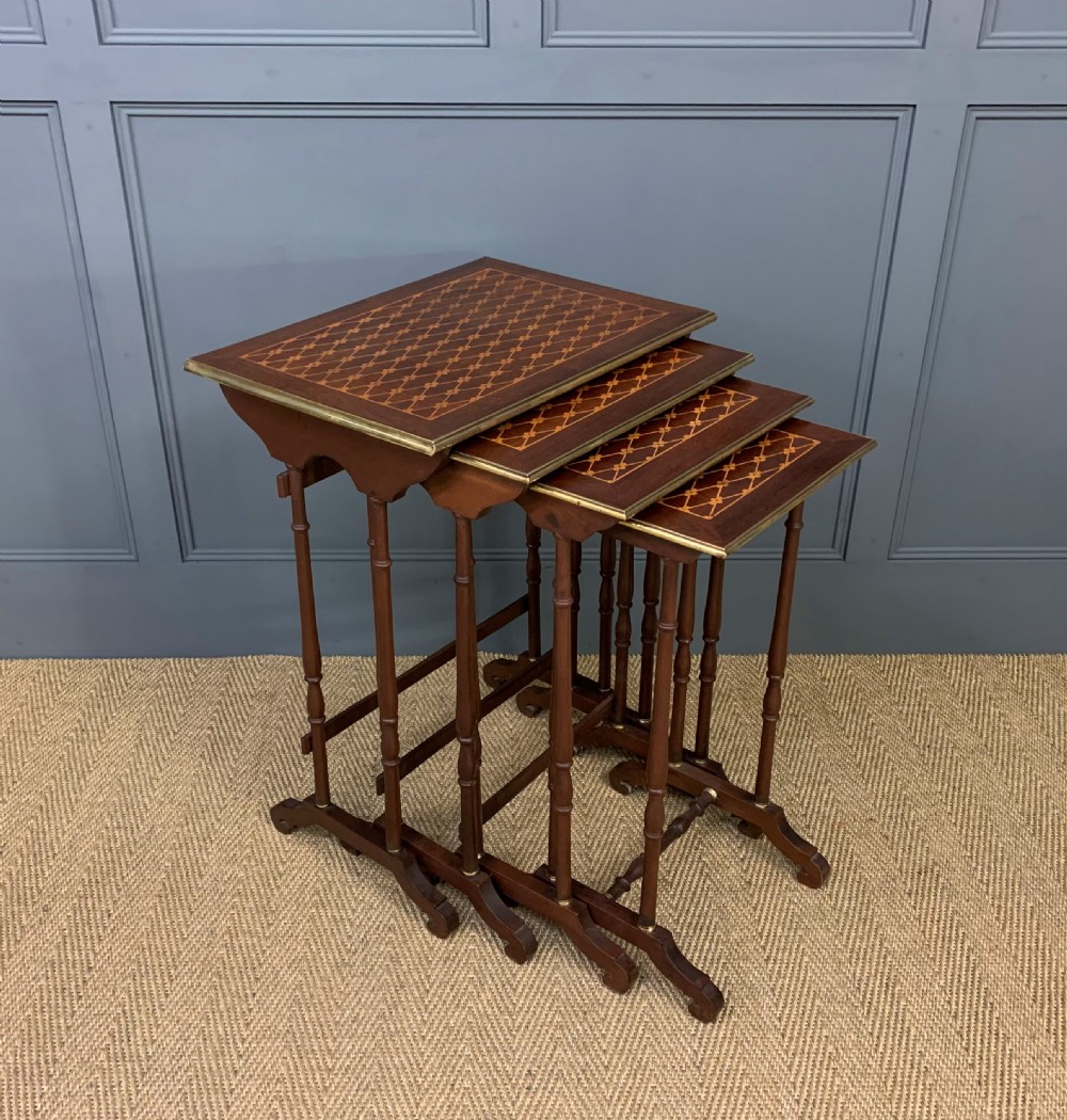 nest of 4 marquetry inlaid tables
