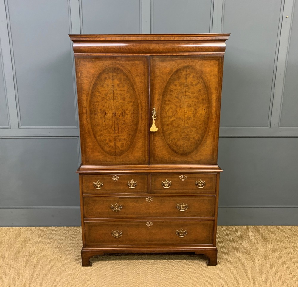 burr walnut linen press by waring and gillow