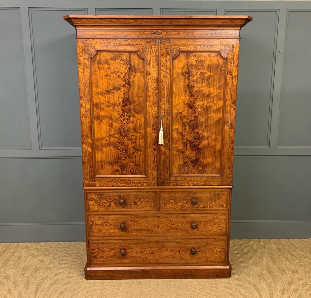 victorian inlaid pine linen press by bell and coupland