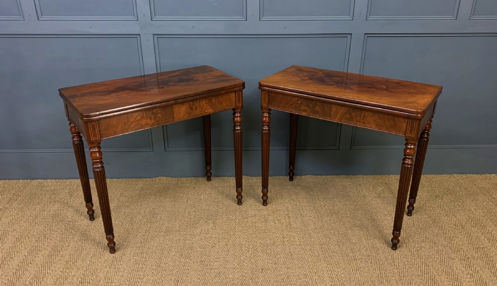 pair of 19th century flame mahogany card tables