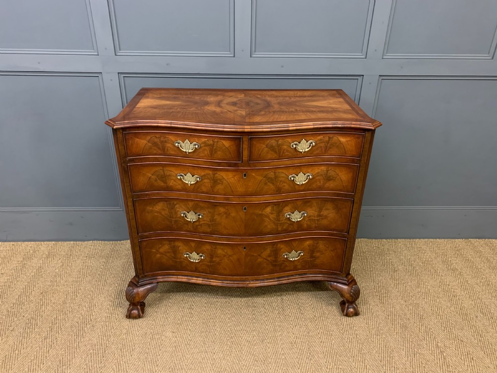 serpentine fronted burr walnut chest of drawers