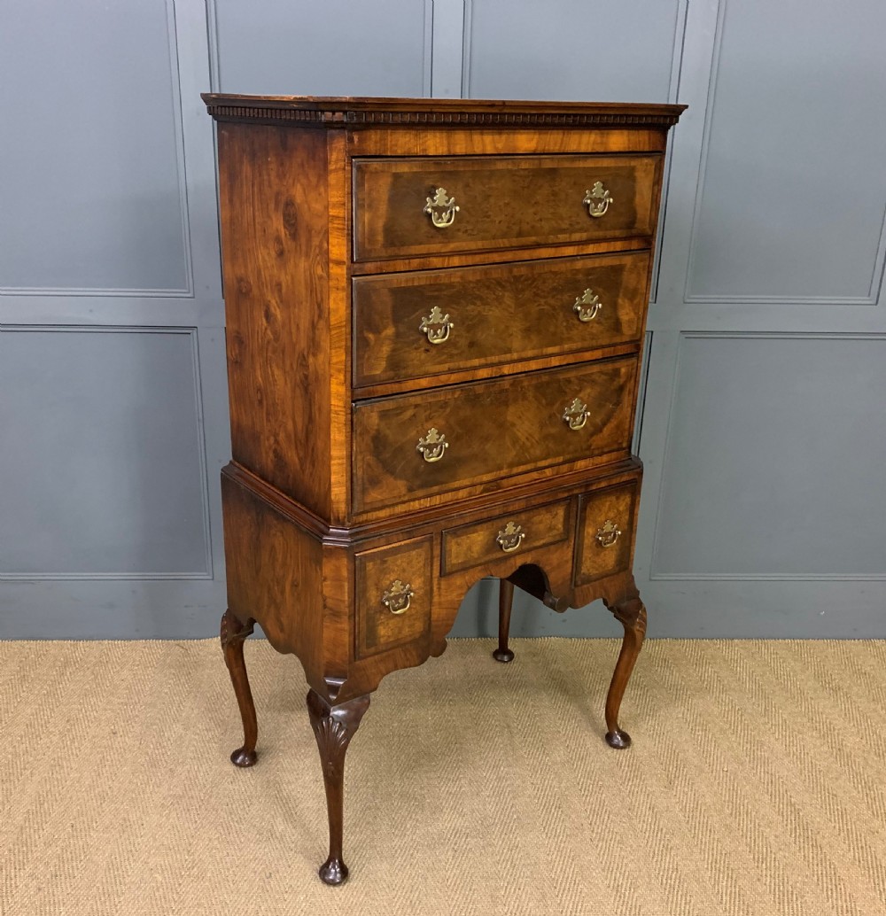 burr walnut chest on stand or tallboy