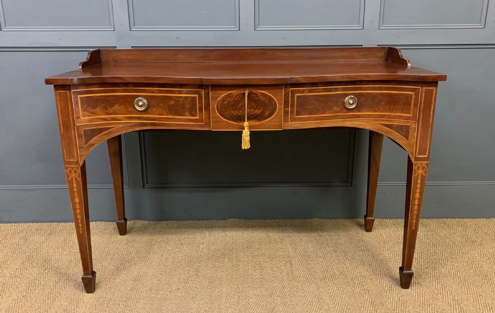 inlaid mahogany serpentine fronted serving table