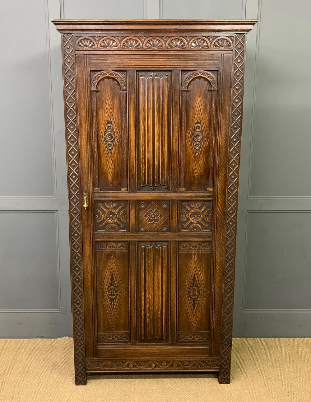 carved oak wardrobe