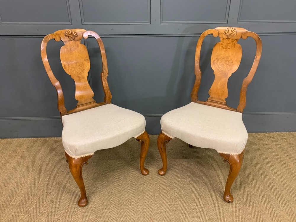 pair of walnut chairs by maple co