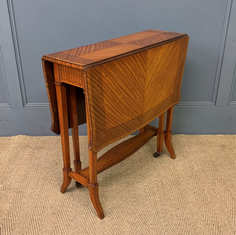 inlaid satinwood butterfly shaped sutherland table