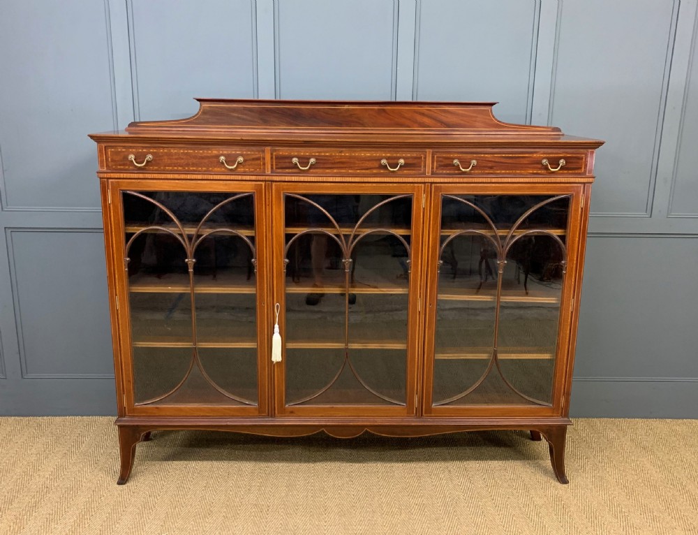 inlaid mahogany bookcase by maple co