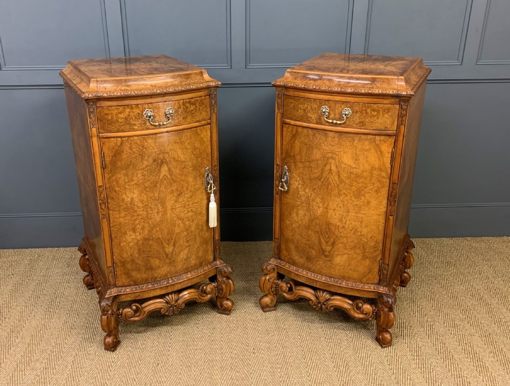 tall pair of burr walnut pedestal cupboards