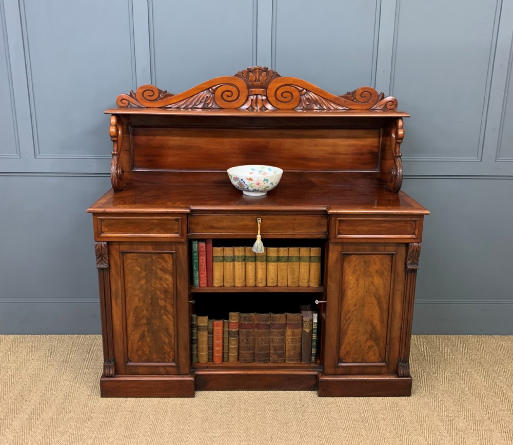early 19th century flame mahogany chiffonier bookcase