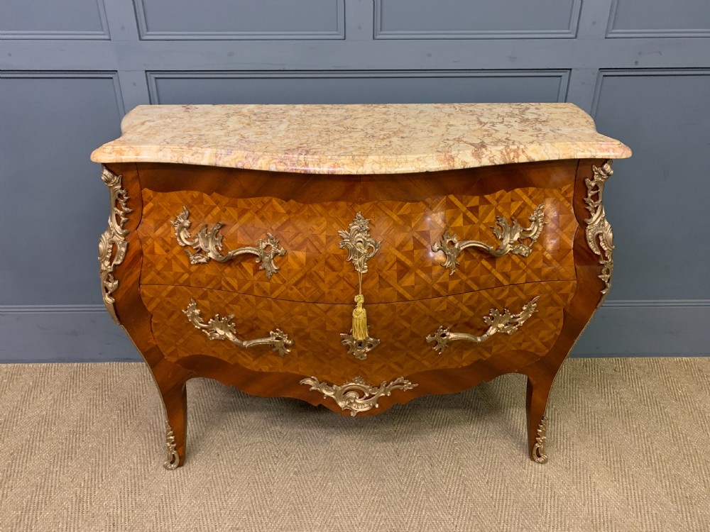 french parquetry inlaid bombe commode