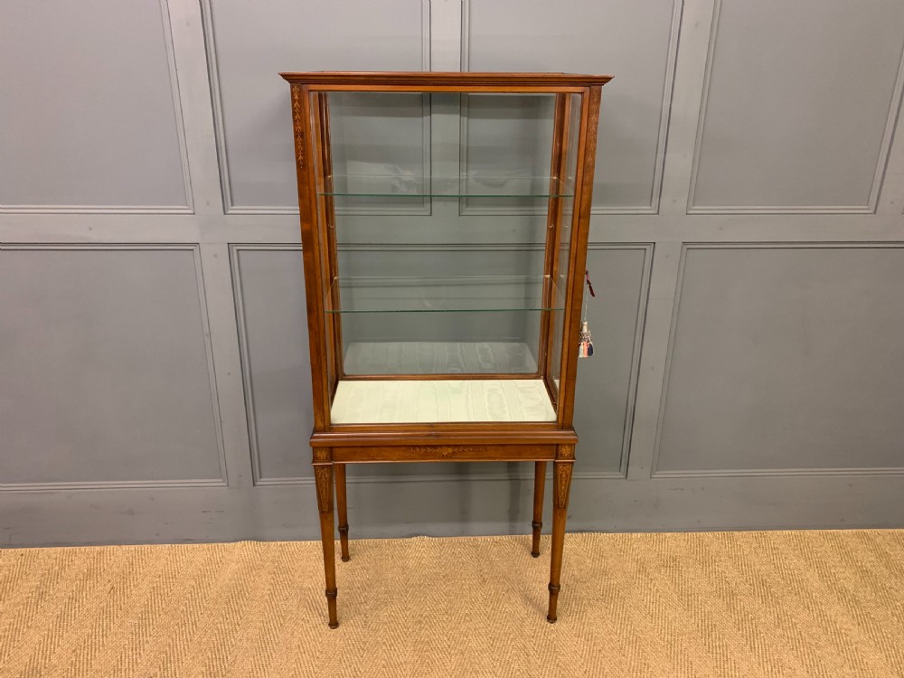 inlaid mahogany display cabinet