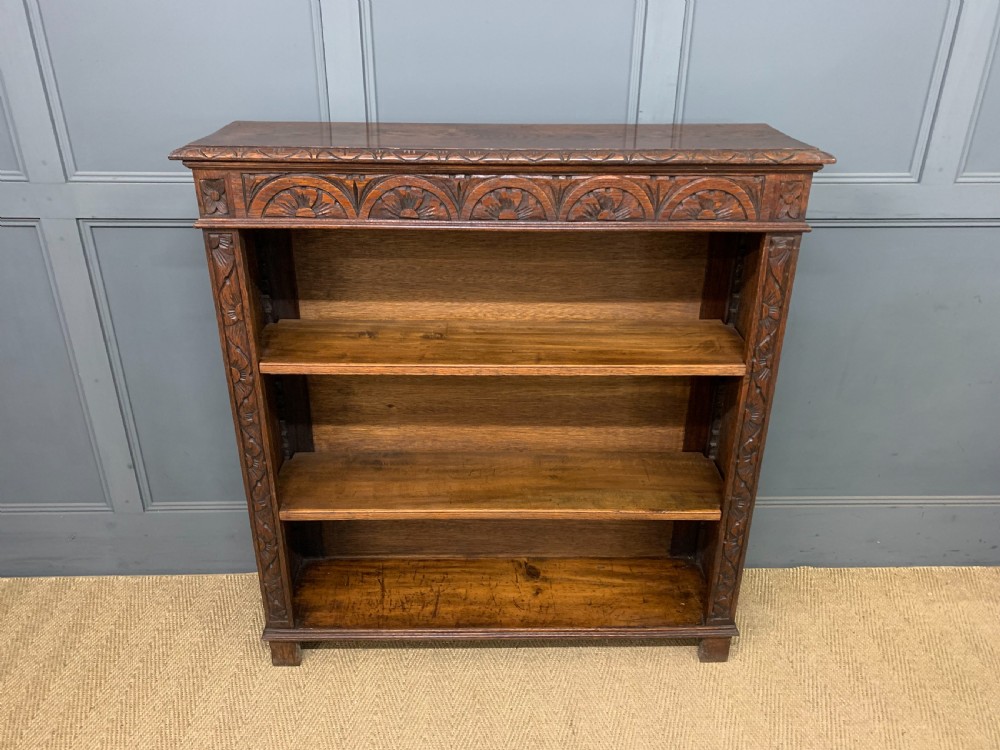 carved oak open bookcase