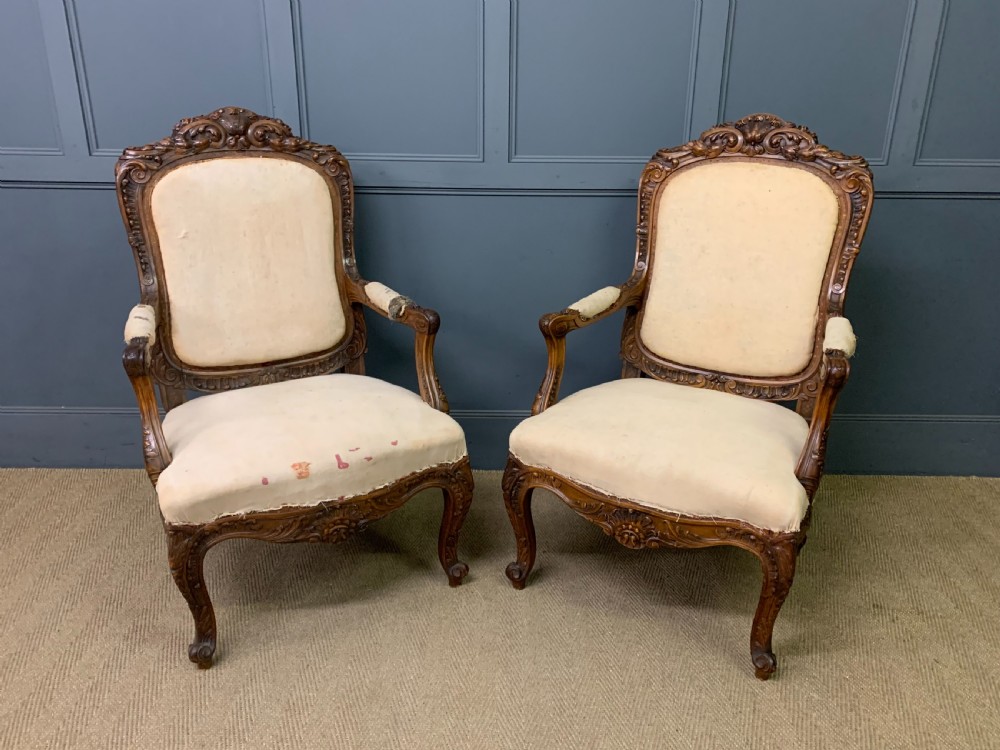 bold pair of french walnut fauteuils