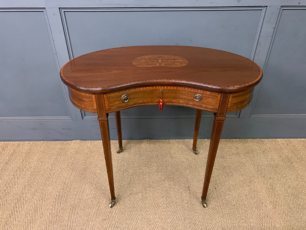 inlaid mahogany kidney shaped table