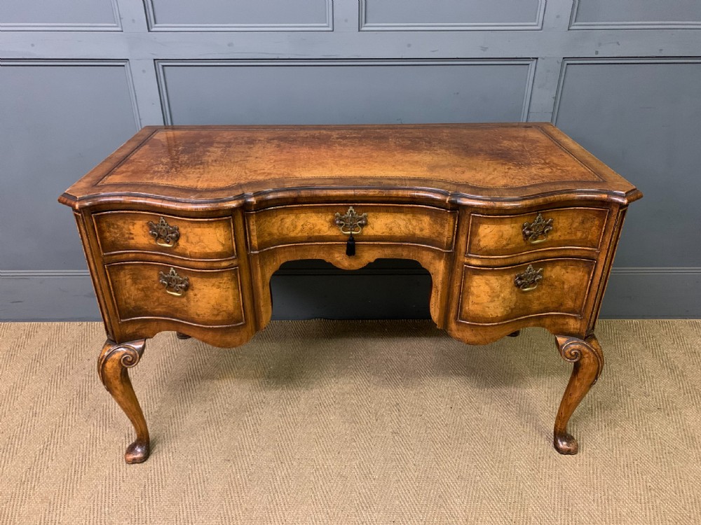 serpentine fronted burr walnut writing desk