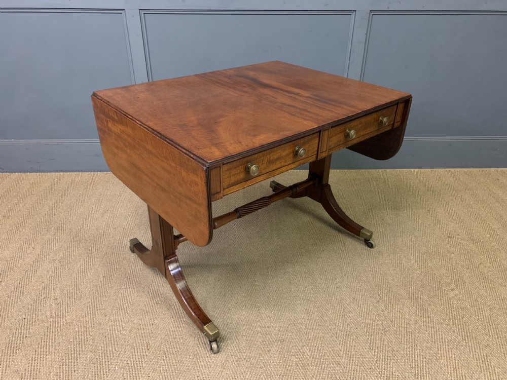 regency ebony inlaid mahogany sofa table