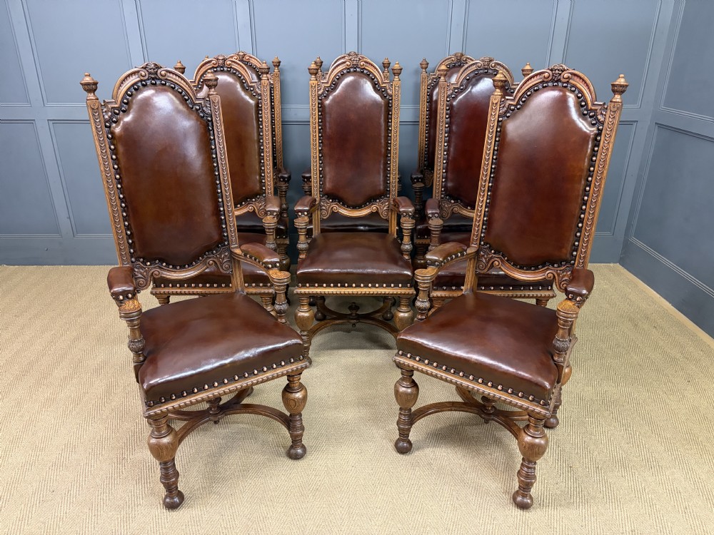set of 8 carved oak high back chairs