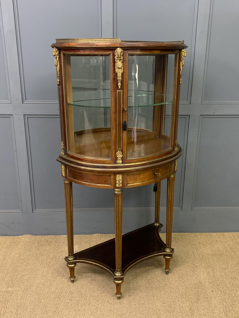 demi lune brass inlaid french mahogany vitrine