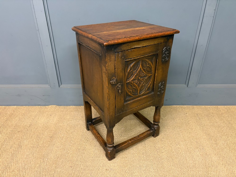 carved oak cupboard